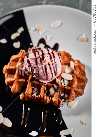 Viennese Waffles with ice cream and coffee. Beautiful picture of dessert with latte coffee. Dessert concept, sweet life. Food photo, copy space, gray background. Viennese Waffles with ice cream and coffee. Beautiful picture of dessert with latte coffee. Dessert concept, sweet life. Food photo, copy space, gray background. 63790713