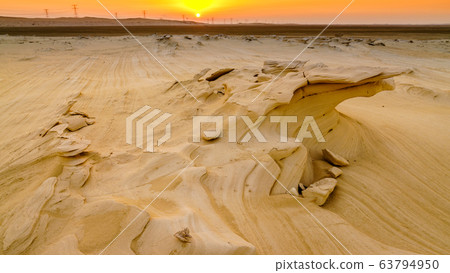 Alwathba Fossil Dunes at sunset Alwathba Fossil Dunes at sunset 63794950