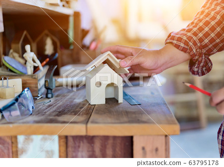 Carpenter working in carpentry shop. Woodwork for Carpenter working in carpentry shop. Woodwork for 63795178