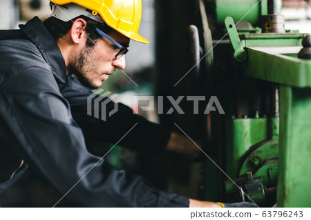 Young American worker intend to work in a heavy industrial factory. 63796243