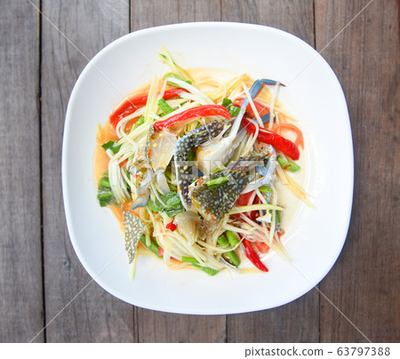 Papaya salad with blue crab / Thai food raw crab Papaya salad with blue crab / Thai food raw crab 63797388