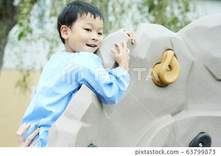 Kindergarten children play Kindergarten children play 63799873
