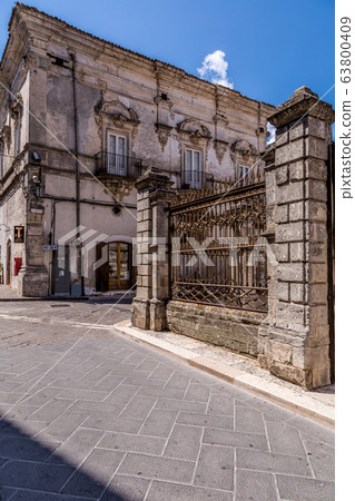 Narrow streets and stairs lined with white houses Narrow streets and stairs lined with white houses 63800409