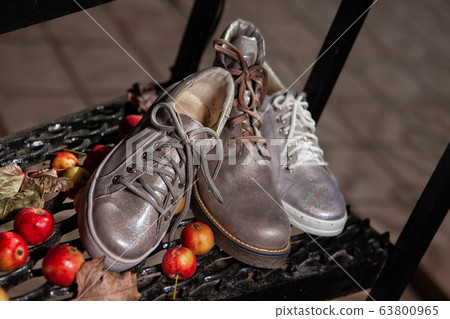 Different Shoes On A Natural Outside Background Different Shoes On A Natural Outside Background 63800965