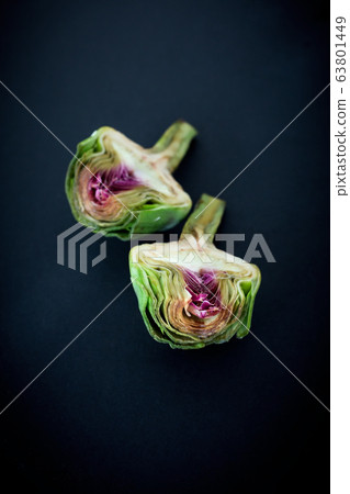 Fresh raw half cut artichokes 63801449
