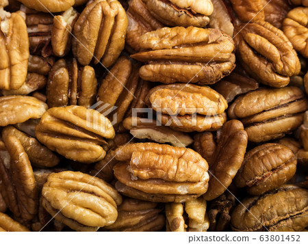 Pecan nuts background 63801452