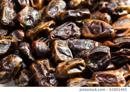 Dates fruit background. Dried date Dates fruit background. Dried date 63801465