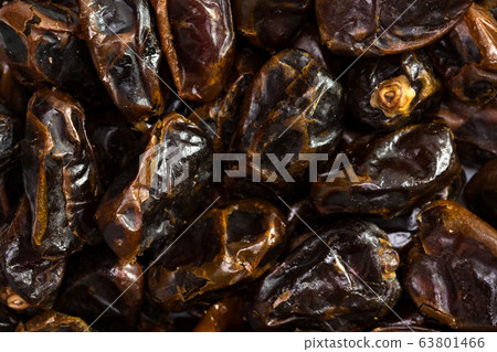 Dates fruit background. Dried date Dates fruit background. Dried date 63801466