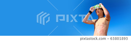 Man with snorkel mask on blue sky background Man with snorkel mask on blue sky background 63801893