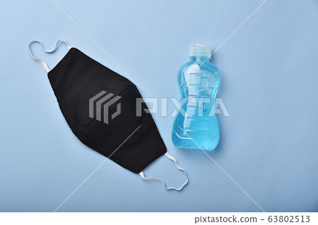 Alcohol hand gel sanitizer and face mask. 63802513