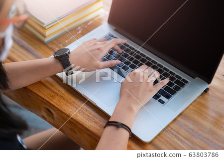 Junior high school girl do homework 63803786