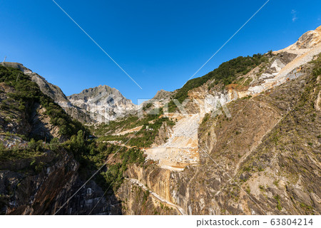 Apuan Alps Italy - Famous quarries of white Carrara marble 63804214