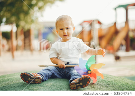 Cute little boy have fun on a playground 63804784