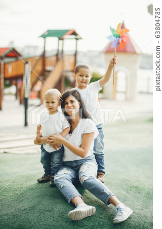 Mother with little child on a playground Mother with little child on a playground 63804785