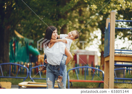 Mother with little child on a playground Mother with little child on a playground 63805144