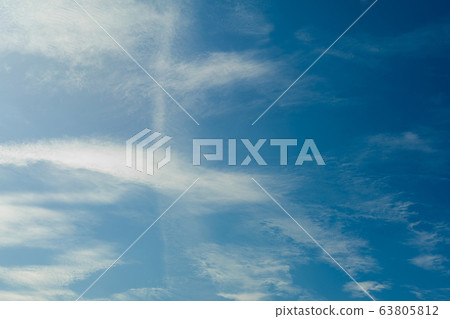 Incredibly beautiful clouds against a sunny blue 63805812