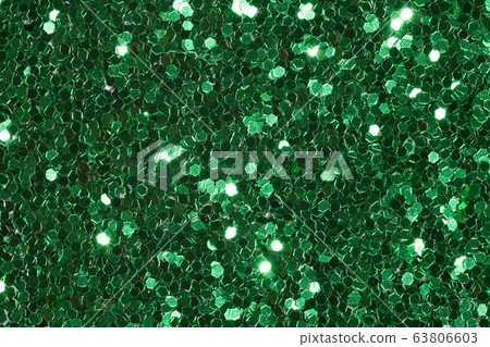 Green background with contrast and glitter. 63806603