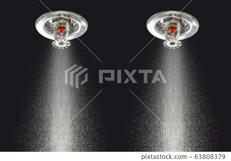 Image of Fire Sprinklers Spraying with fire background. Fire sprinklers are part of an overall safety protocol for fire and life safety. Image of Fire Sprinklers Spraying with fire background. Fire sprinklers are part of an overall safety protocol for fire and life safety. 63808379