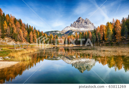 Autumn in italian dolomites - lago antorno Autumn in italian dolomites - lago antorno 63811269
