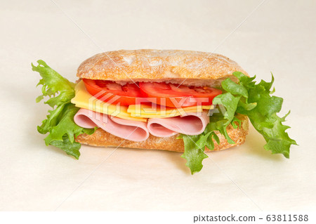 Sandwich with lettuce, ham and tomatoes and Sandwich with lettuce, ham and tomatoes and 63811588