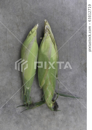 Fresh corn on concrete floor 63812719