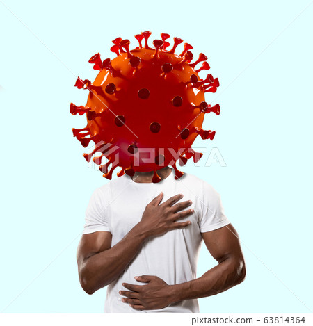 Man headed by model of COVID-19 coronavirus, concept of pandemic spreading 63814364