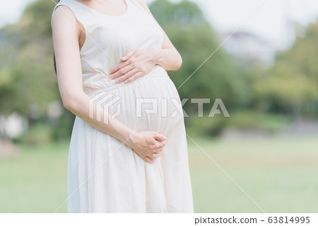 pregnant, pregnant woman, green color 63814995