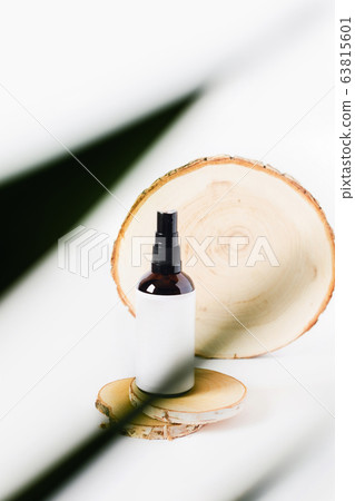 Vertical advertising picture with flowers and can. Vertical advertising picture with flowers and can. 63815601