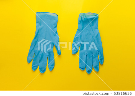protective mask and gloves on a yellow background protective mask and gloves on a yellow background 63816636
