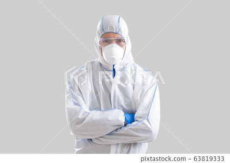 Coronavirus epidemic control concept. Asian man with crossed arms Coronavirus epidemic control concept. Asian man with crossed arms 63819333