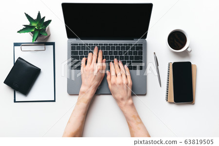 Middle aged woman hands typing on modern laptop 63819505