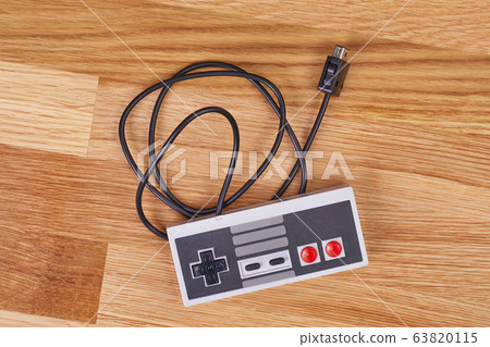 Old console gaming controller 63820115