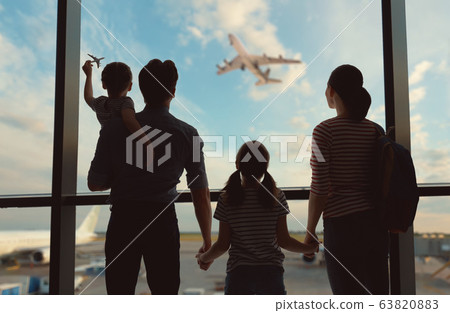 Happy family at the airport. Happy family at the airport. 63820883