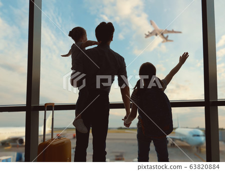Happy family at the airport. Happy family at the airport. 63820884