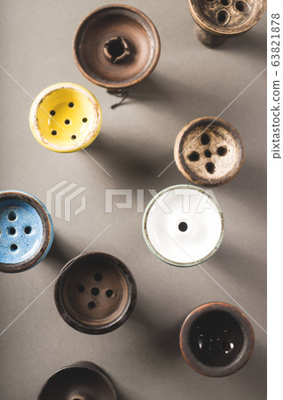 Many different ceramic color bowls for hookah. Many different ceramic color bowls for hookah. 63821878