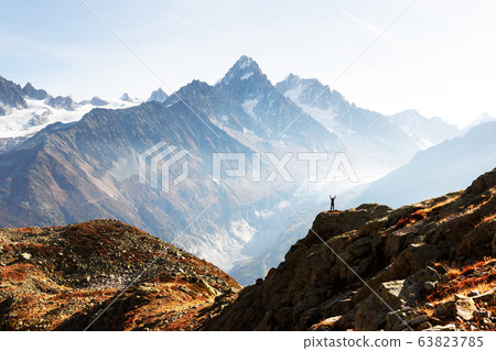Amazing view on Monte Bianco mountains range with tourist on a foreground 63823785