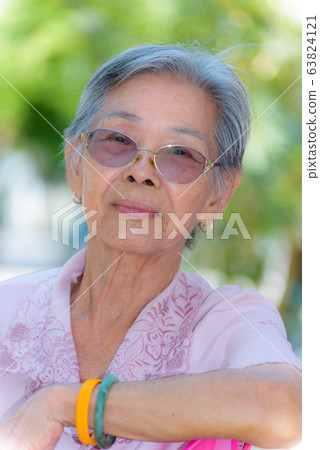 Portrait of beautiful senior woman 63824121