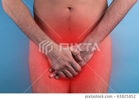 Man Covering His Crotch. the concept of male illness. prostate cancer. impotence. Man Covering His Crotch. the concept of male illness. prostate cancer. impotence. 63825852