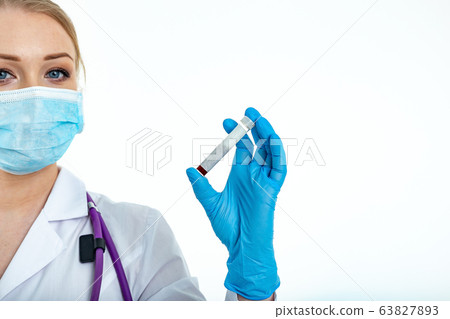 Side photo of a doctor in a white coat, wearing Side photo of a doctor in a white coat, wearing 63827893