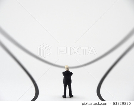 People who are lost in choice at a forked road People who are lost in choice at a forked road 63829850