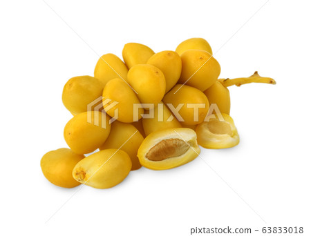 yellow raw date palm isolated on white background. yellow raw date palm isolated on white background. 63833018