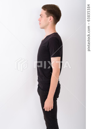 Young handsome man against white background Young handsome man against white background 63835384