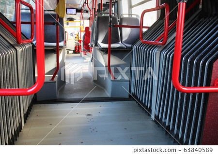 Empty seats in a city bus. Coronavirus impact Empty seats in a city bus. Coronavirus impact 63840589
