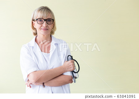 Female doctor with stethoscope in hands blur 63841091