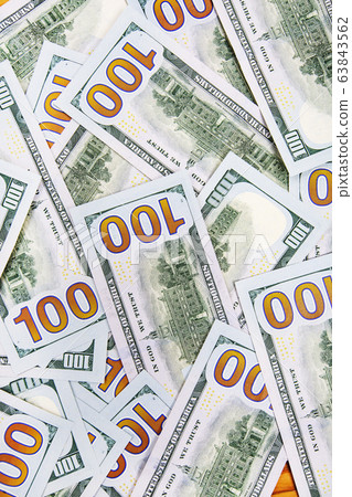 A pile of US banknotes with president portraits. A pile of US banknotes with president portraits. 63843562