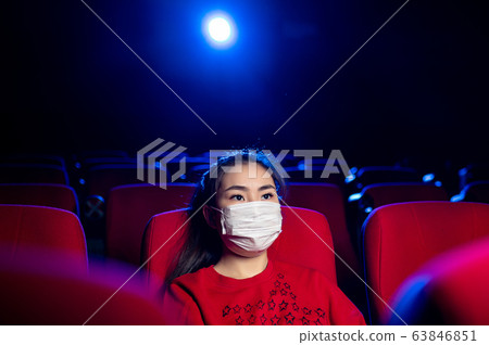 sick person cinema mask watch movie public virus 63846851