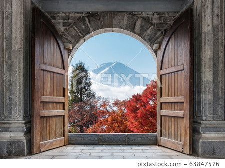 Open large wooden door with mount Fuji-san and 63847576