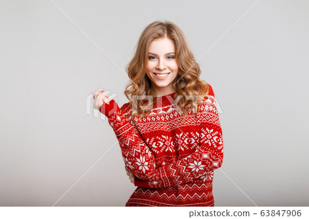 Happy young girl with a smile 63847906