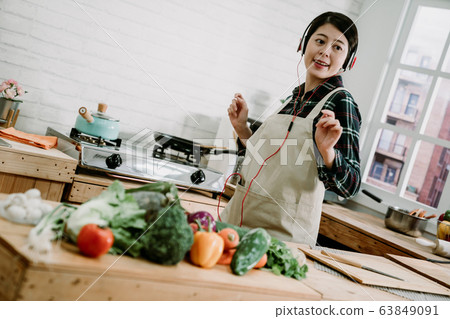 Enjoying her morning. Beautiful young asian Enjoying her morning. Beautiful young asian 63849091