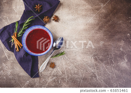 Fresh cranberry apple sauce in blue bowl 63851461